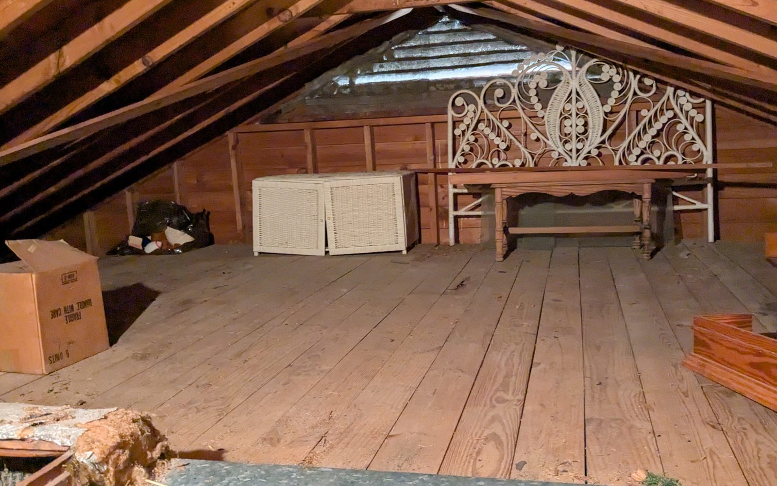 Attic storage area after cleanup and removal help